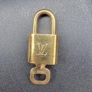 Louis Vuitton Shiny Gold Lock